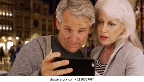 Mature Couple Arguing About Directions In Venice