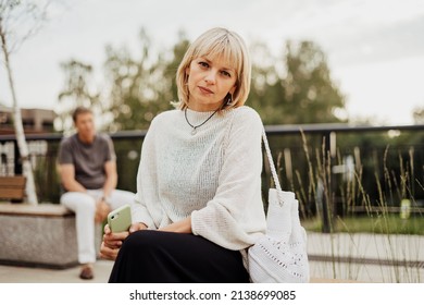 Mature Couple In A Bad Mental Condition After A Quarrel Outdoors. Adult Couple Man And Woman Trying To Overcome Anxiety And Disorder After A Break-up Scene.