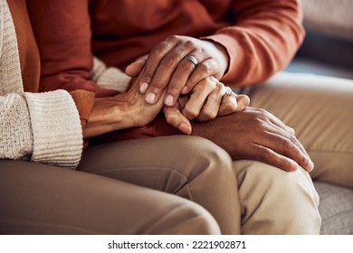 Mature Couple, Bonding And Holding Hands In Support, Trust Or Security In House, Home Or Marriage Counseling Sofa. Zoom, Black Woman Or Man In Counselling Therapy For Mental Health, Anxiety Or Stress