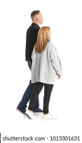 Mature Couple In Casual Clothes Walking On White Background