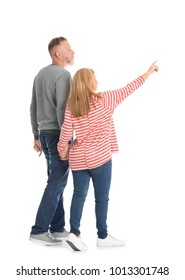 Mature Couple In Casual Clothes Walking On White Background