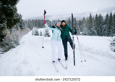 Mature Couple Cross Country Skiing Outdoors In Winter Nature, Tatra Mountains Slovakia.