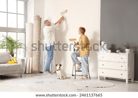 Similar – Image, Stock Photo Elderly woman paints on canvas in a bright studio