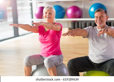 Senior Couple Exercising Gym Stock Photo (Edit Now) 520248679