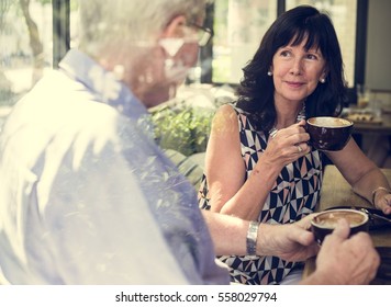 Mature Couple Enjoying Coffee Together