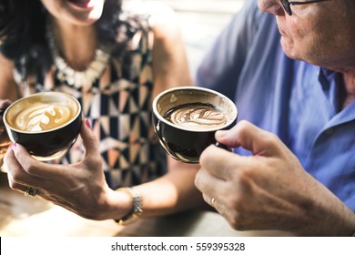 Mature Couple Enjoying Coffee Together