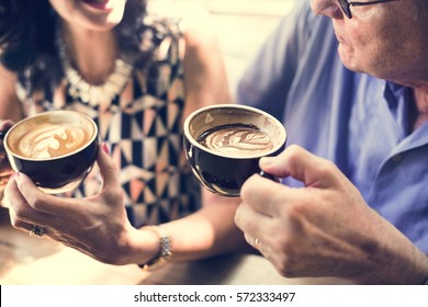 Mature Couple Enjoying Coffee Together