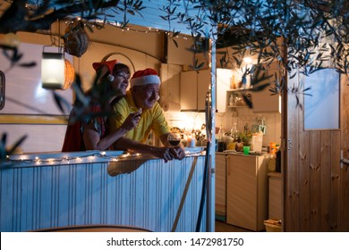 Mature Couple Enjoying On New Years Evening In Their Beach House