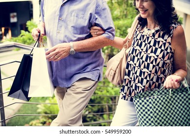 Mature Couple Enjoying Shopping Around