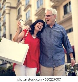 Mature couple enjoying shopping around