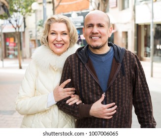 Mature couple having a walk together outdoors