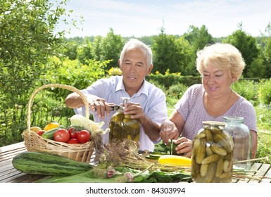 Mature Couple Making Home Made Pickles