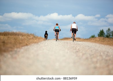 Mature Couple On Bike. Sport, Active Lifestyle