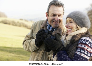 Mature Couple On Country Picnic In Winter