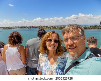 A Mature Couple On A Cruise Ship As It Arrives In Venice And Having A Great Time