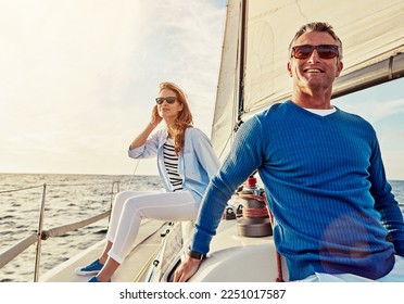 Mature couple, people or sailing yacht bonding on ocean, sea or water in relax holiday, vacation or summer adventure. Smile, happy man or woman on luxury boat in retirement travel location or freedom - Powered by Shutterstock