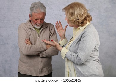 Mature Couple In Quarrel. Senior Woman accuses her husband. Family arguing, disagreement concept - Powered by Shutterstock