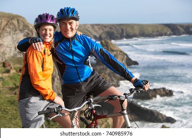 Mature Couple Riding Bikes