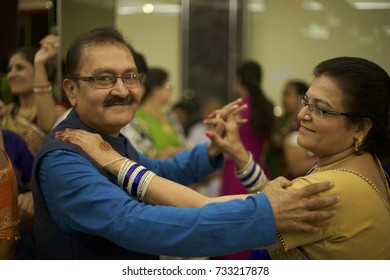 A Mature Couple Are Seen Dancing In Joy At A Wedding Reception In Malad, Mumbai, Maharashtra, India. Shot In 2017.