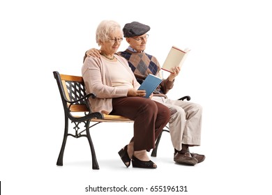 Mature Couple Sitting On A Bench And Reading Books Isolated On White Background