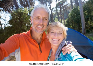 Mature Couple Taking A Photo Their Camp Site