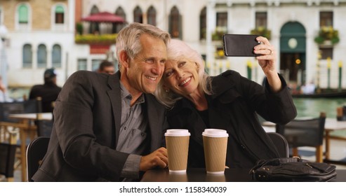 Mature Couple Taking A Selfie In Venice