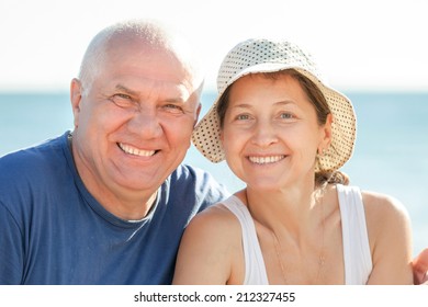 Mature Couple Together At Sea Beach