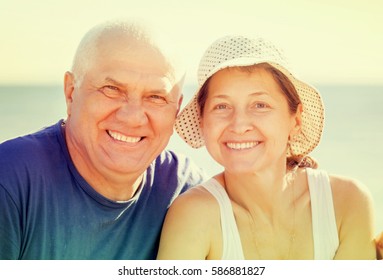 Mature Couple Together At Sea Beach