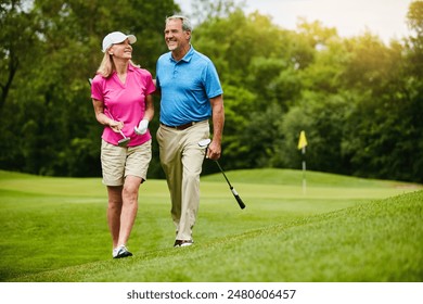 Mature, couple and walk on golf course, outside and healthy fitness activity with golfers together with club. Relaxing, weekend break and happy with smile for sport, nature exercise and people - Powered by Shutterstock