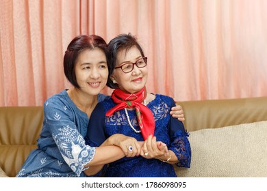 Mature Daughter Coming Home And Hug Mother On The Mother's Day