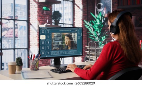 Mature developer coding cloud computing with AI chatbot on pc, working from her home and focuses on the software development process for productivity and innovation. Prompts for code. Camera B.