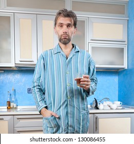 Mature Drunk Man Standing In Pajamas With Glass