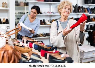 Mature European Woman Who Came To A Shoe Store For Shopping, Chooses Ballet Flats