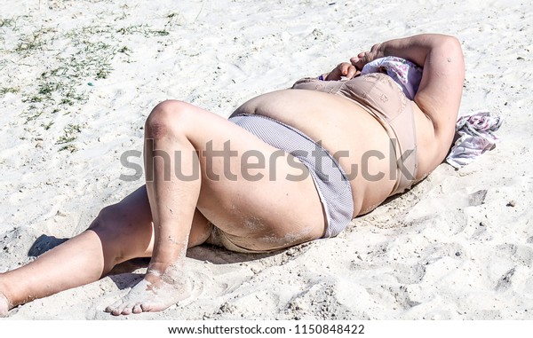 Mature Women Sunbathing