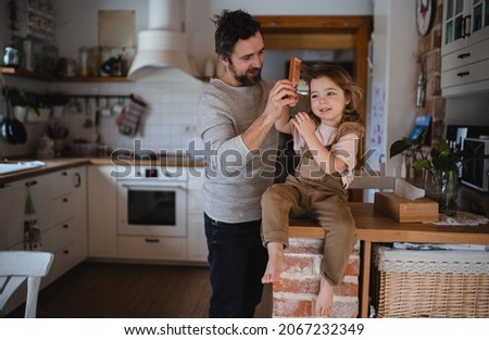 Similar – Image, Stock Photo father combing Lifestyle