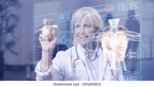 Mature Female Doctor Looking At AR Medical Charts At A High Tech Hospital