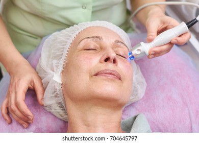 Mature Female, Rf Skin Tightening. Face Of Adult Woman, Cosmetology. Radio Frequency Treatment Facts.