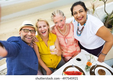 Mature Friends Fine Dining Outdoors Concept