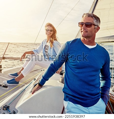 Mature, happy couple or retirement sailing yacht on ocean, sea or water relax holiday, wealth vacation or success summer. Smile, man or woman on luxury boat in investment, travel or freedom adventure