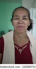 A Mature Hispanic Woman Portrait Face Looking At Camera. An Older Latin South American Lady.