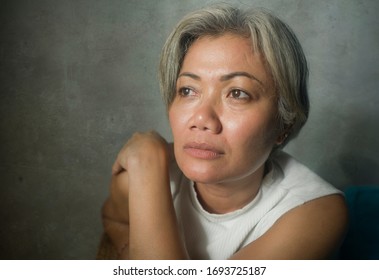 Mature Lady Crisis - Indoors Lifestyle Portrait Of Middle Aged Woman With Grey Hair Sad And Depressed Feeling Frustrated And Lonely Thinking About Aging Lonely Suffering Depression 