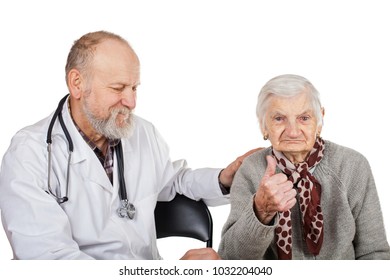 Mature male doctor taking care of disabled old woman on isolated background - Shutterstock ID 1032204040