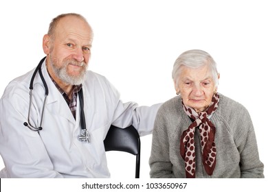 Mature male doctor taking care of disabled old woman on isolated background - Shutterstock ID 1033650967