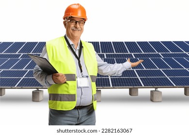 Mature male engineer presenting a solar farm isolated on white background - Shutterstock ID 2282163067