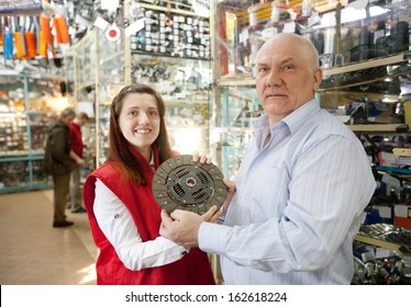 Mature Man Buys Engine Clutch In Auto Parts Store