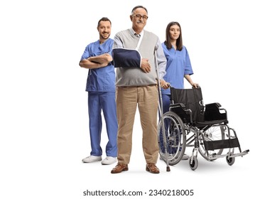 Mature man with crutches and arm sling standing in front of a a female nurse with a wheelchair and a male health care worker isolated on white background - Powered by Shutterstock