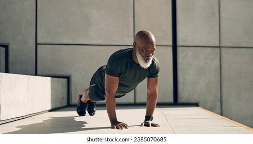 Mature, man and fitness for exercise with pushup for strength, health or wellness by outside. African person, alone and training near stairs for workout with endurance, concentration and dedication - Powered by Shutterstock