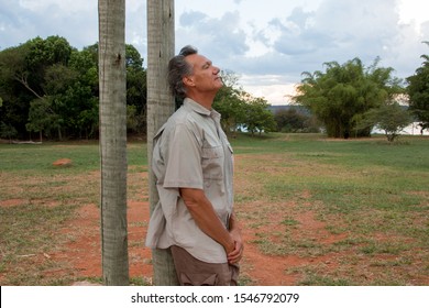 Mature Man Hanging Out At The Park Wearing Casual Clothes 