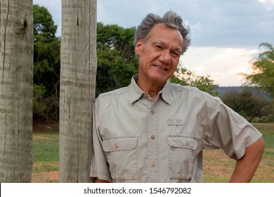 Mature Man Hanging Out At The Park Wearing Casual Clothes 