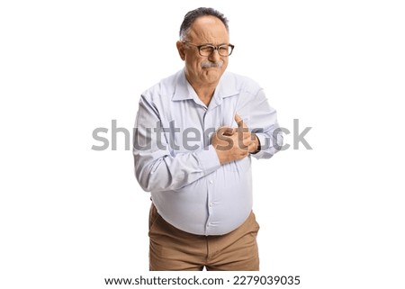 Mature man having a heart attack isolated on white background